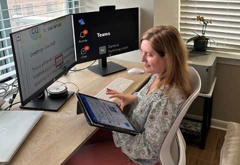 Stacy Pommer, the national affiliations officer for the Office of Academic Affiliations, uses an iPad with accessibility settings to enhance text while working. Pommer is currently working on a special project to improve reasonable accommodation processes at VA facilities for health professions trai